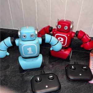 FAO Schwarz Red and Teal Remote Control Robots